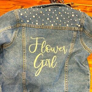 Medium David’s bridal flower girl jacket. Worn once